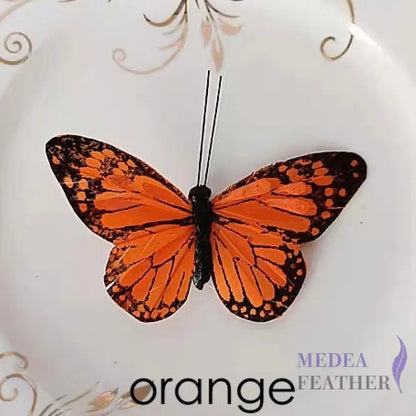 9cm wide Handmade Feather Butterflies Orange